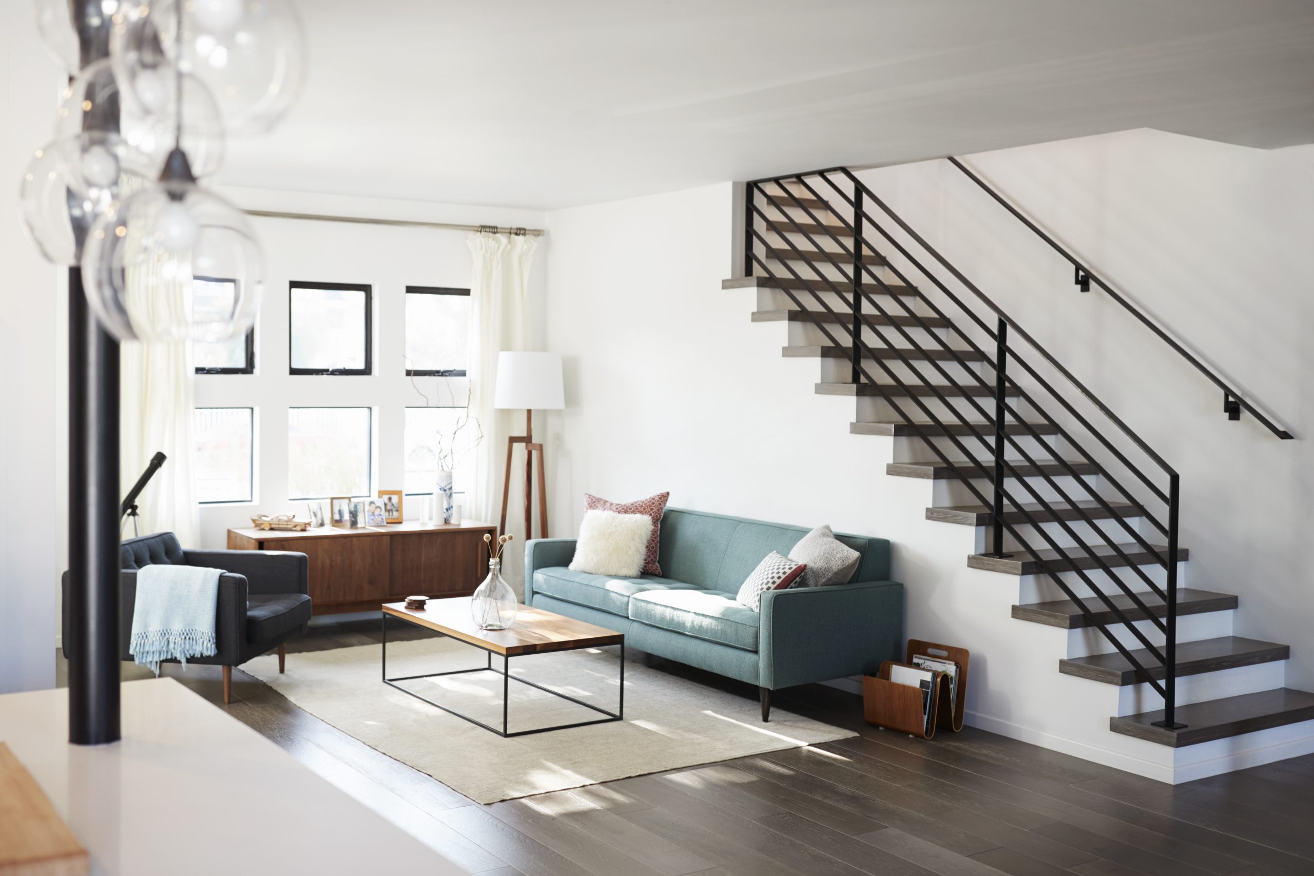 interior-view-of-contemporary-lounge-with-staircas-FZTR8DX-scaled.jpg